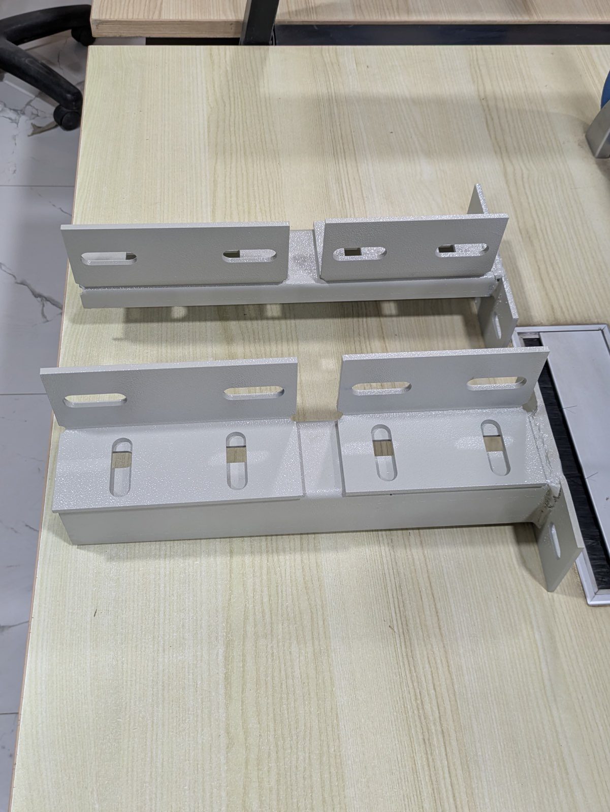 Precision-machined guide rail brackets